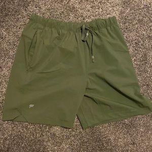 Perfectly good condition olive green shorts by Fabletics